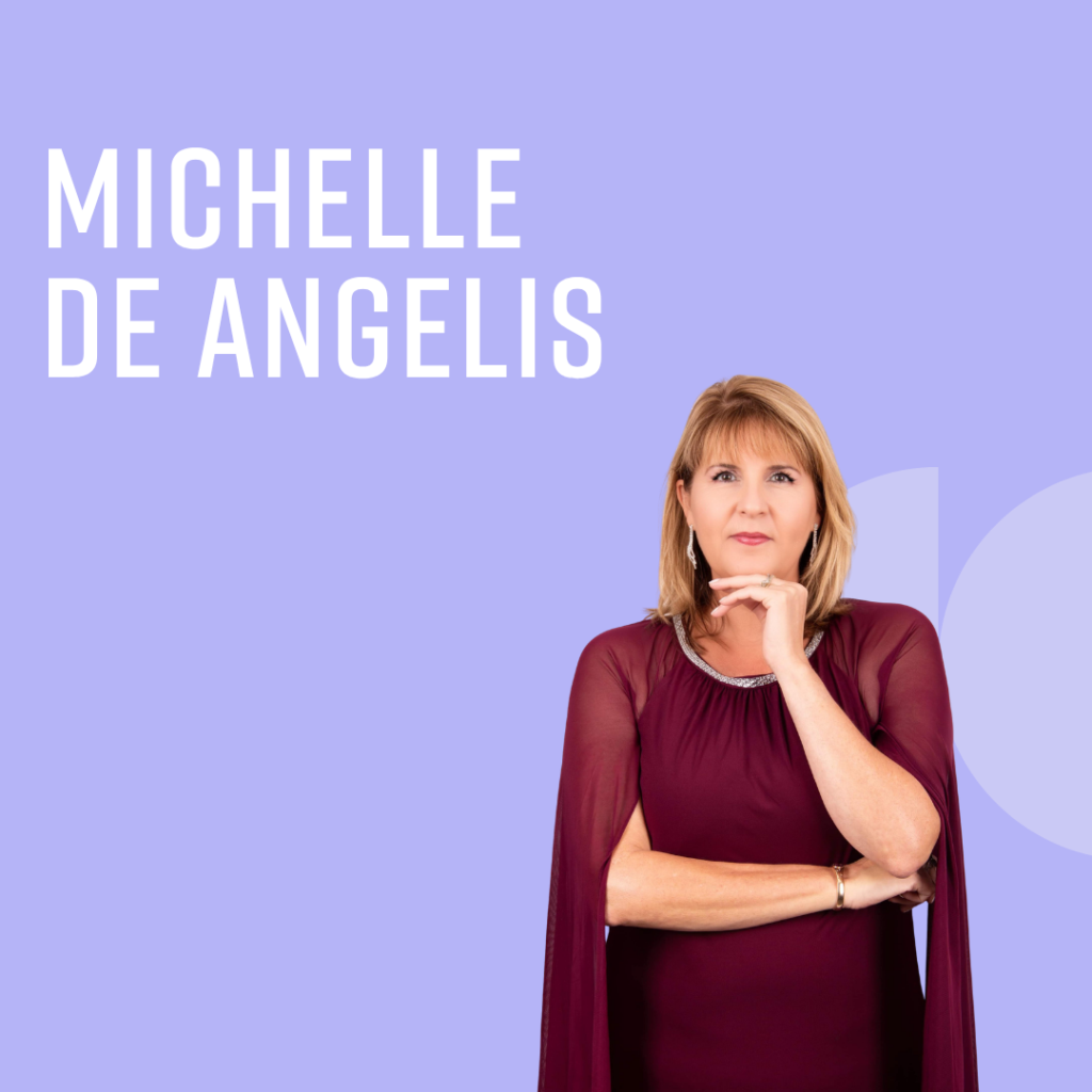 A woman with shoulder-length blonde hair stands with one hand on her chin and the other arm crossed, in front of a purple background with the text "Michelle De Angelis.