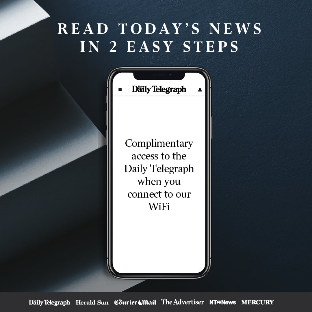 Smartphone displaying message: “Complimentary access to the Daily Telegraph when you connect to our WiFi,” with newspaper names listed at the bottom.